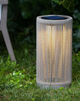 Solar-powered outdoor lamp on grass with a blurred background by Les Jardins available at Spacio retail stores in India.