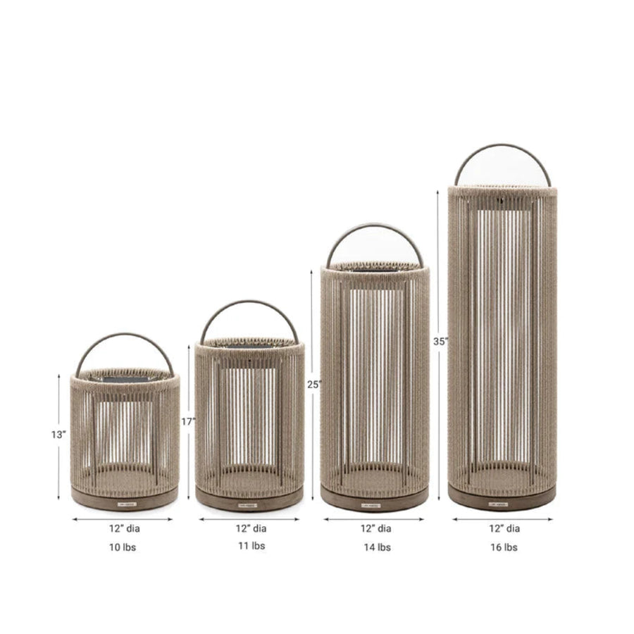 Set of four woven solar lanterns with dimensions and weight labels on a white background by Les Jardins available at Spacio retail stores in India.