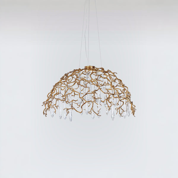 A dome shaped chandelier hanging on wires with water drops shaped glass suspended from branches in gold colour