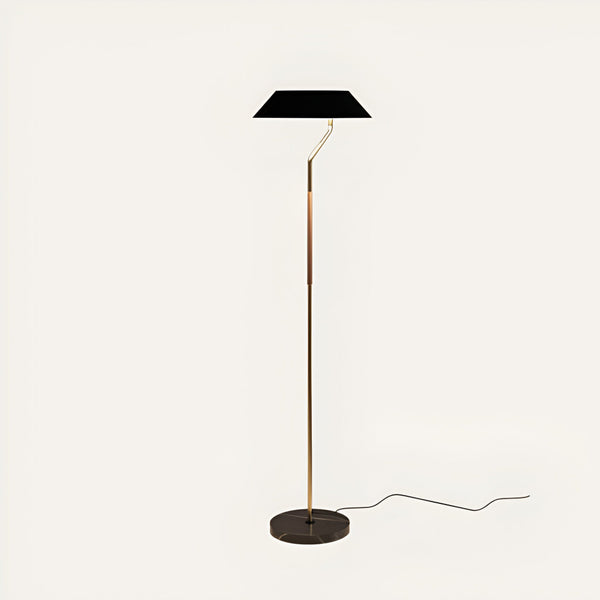 Floor lamp with black shade and gold base on a white background from Aromas Del Campo available at Spacio retail stores in Mumbai & Kolkata. 