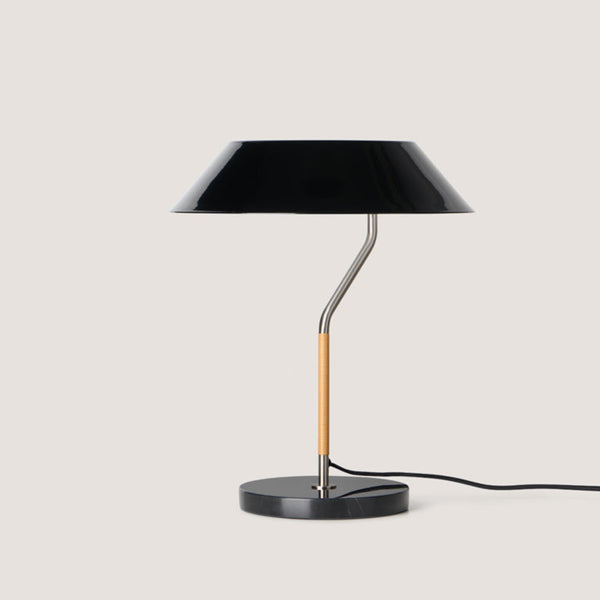 A modern design table lamp in black metal , marble base and wooden finish from Aromas Del Campo available at Spacio retail stores in Mumbai & Kolkata. 