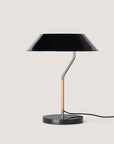 A modern design table lamp in black metal , marble base and wooden finish from Aromas Del Campo available at Spacio retail stores in Mumbai & Kolkata. 