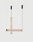 A pair of modern glass suspension lamp hanging from the ceiling, from Aromas Del Campos available at Spacio retail stores in Mumbai & Kolkata. 