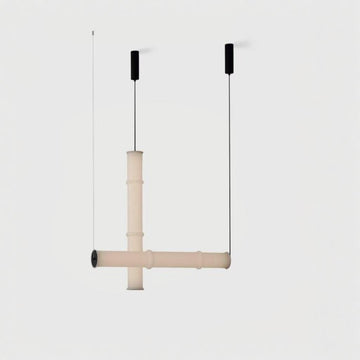 A pair of modern glass suspension lamp hanging from the ceiling, from Aromas Del Campos available at Spacio retail stores in Mumbai & Kolkata. 