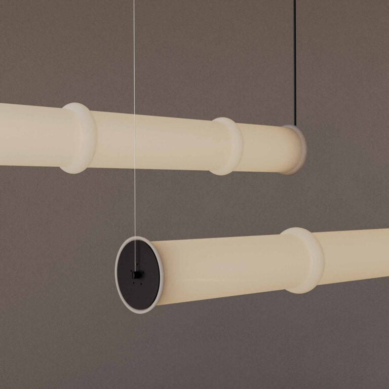 Close up of a pair of modern glass suspension lamp hanging from the ceiling, from Aromas Del Campos available at Spacio retail stores in Mumbai & Kolkata. 