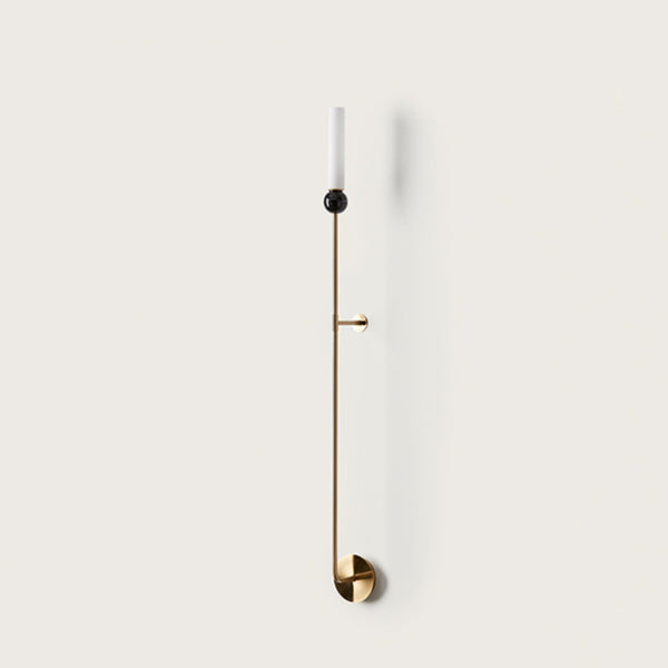 A long wall light on a light grey colour wall