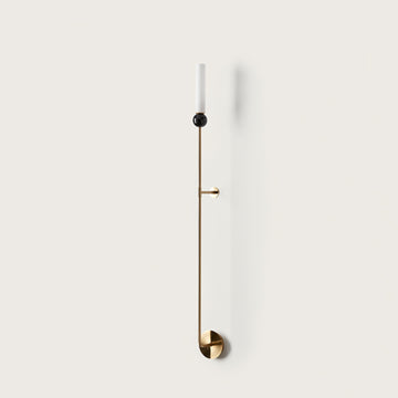 A long wall light on a light grey colour wall