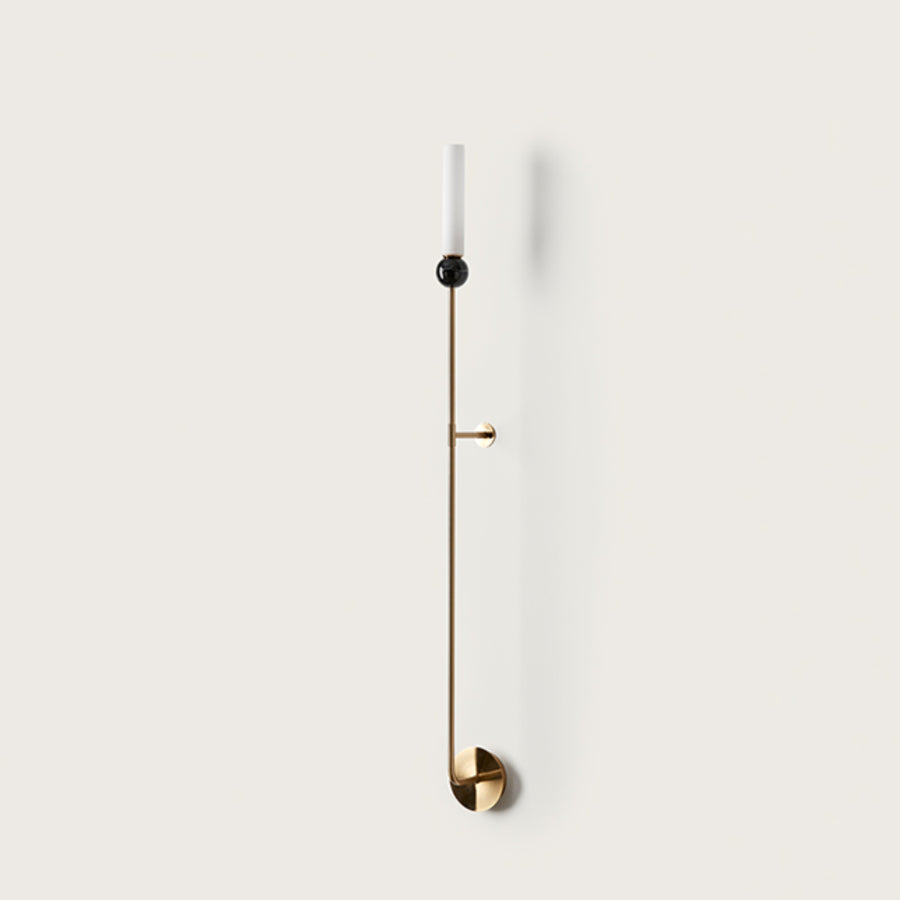 A long wall light on a light grey colour wall