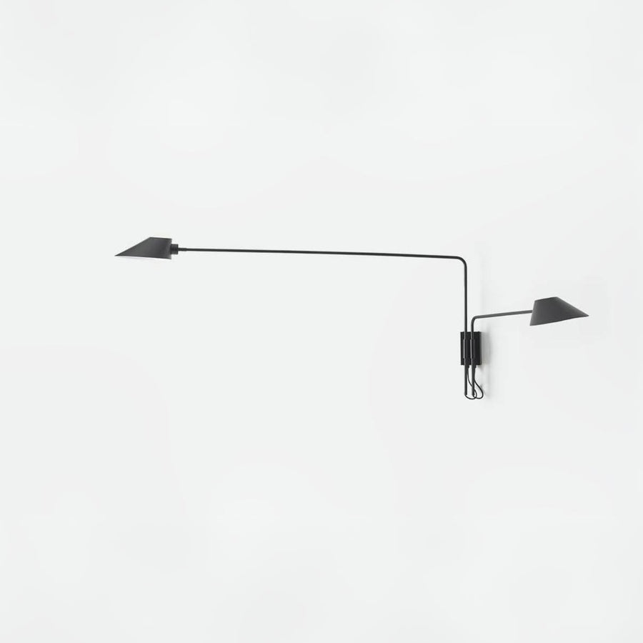 A modern wal light from Aromas Del Campo available at Spacio in India on a white background. 