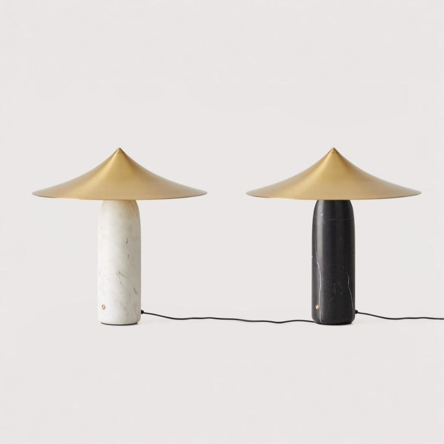 A pair table lamp in black and white marble and brass shades