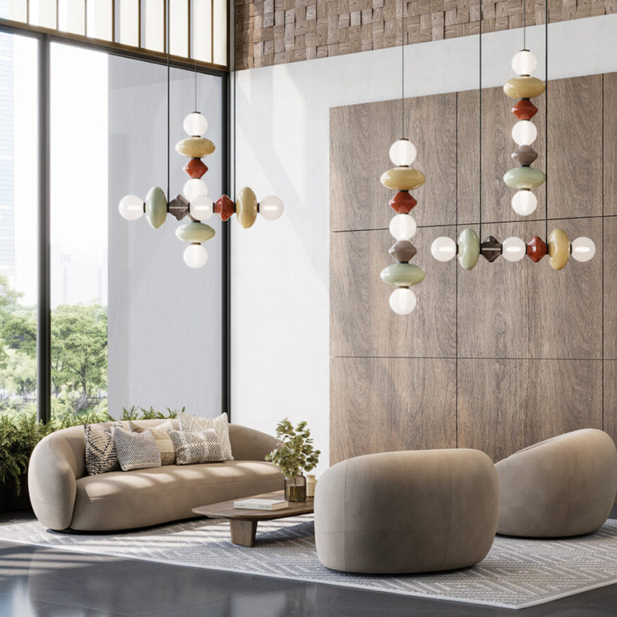 Colourful ceramic suspension lamp in a contemporary theme double height living room from Aromas Del Campo available at Spacio retail stores in Mumbai & Kolkata. 
