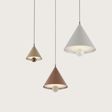3 modern pendant lamps in different colours suspending from ceiling 