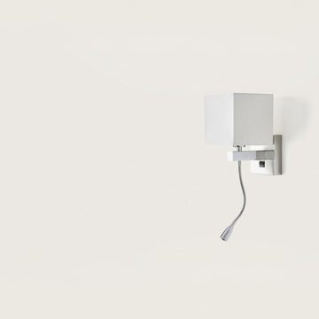 A wall light with white fabric shared on a light cream colour background