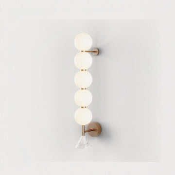 A big modern wall light in marble and glass with brass detailing from Aromas Del Campo available at Spacio retail stores in Mumbai & Kolkata. 
