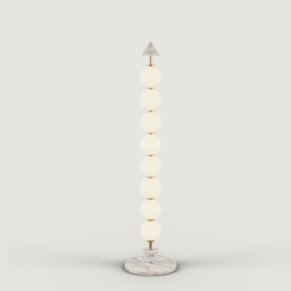 A modern design floor lamp on a light grey background from Aromas Del Campo, available at Spacio retail stores in Mumbai & Kolkata.