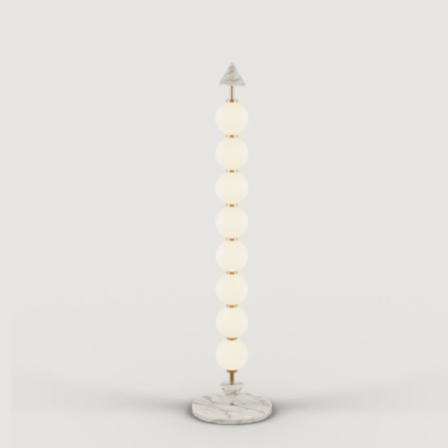 A modern design floor lamp on a light grey background from Aromas Del Campo, available at Spacio retail stores in Mumbai & Kolkata.