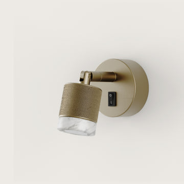 A modern wall bedside lamp with switch from Aromas De Campo and available at Spacio retail stores in Mumbai and Kolkata