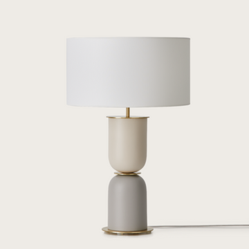 A ceramic table lamp with fabric shade from Aromas Del Campo available at Spacio retail stores in Mumbai & Kolkata. 