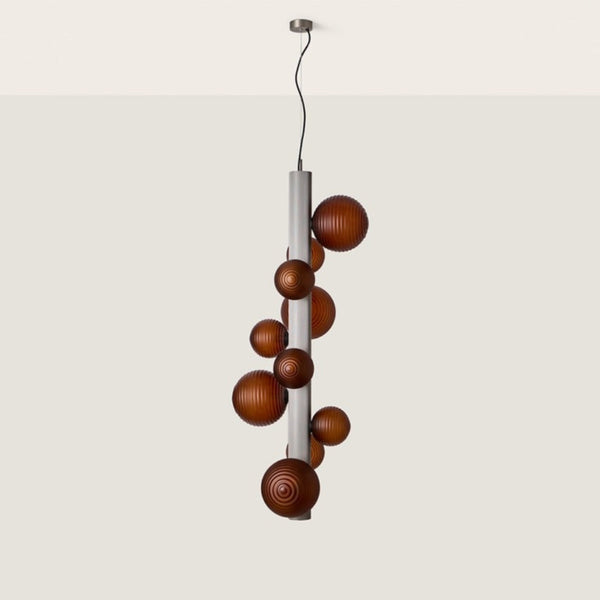A decorative suspension lamp hanging from the ceiling, by Aromas Del Campo available at Spacio retail stores in Mumbai & Kolkata. 