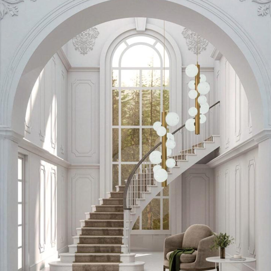 A pair suspension lamp hanging from the ceiling in a classical double height space, by Aromas Del Campo available at Spacio retail stores in Mumbai & Kolkata. 