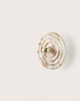 A wall light called WAVE from Aroma Del Campo made of alabaster, available at Spacio retail store in Mumbai & Kolkata. 
