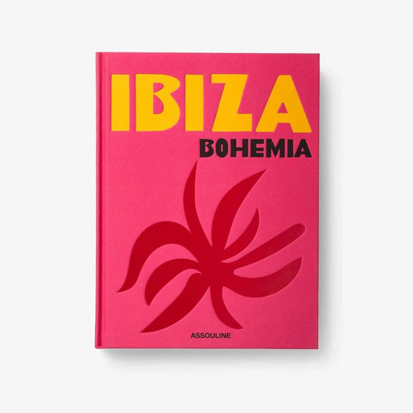 Front view of Ibiza Bohemia book by Assouline, showcasing vibrant pink cover with abstract artwork, offered at Spacio India retail stores.
