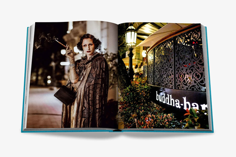 A double spread of Glamorous woman in vintage attire with a cigarette & Buddha-Bar in a luxurious Assouline's Monte Carlo coffee table book, featuring a vibrant cover with images of Monaco's iconic landmarks, available at Spacio India.