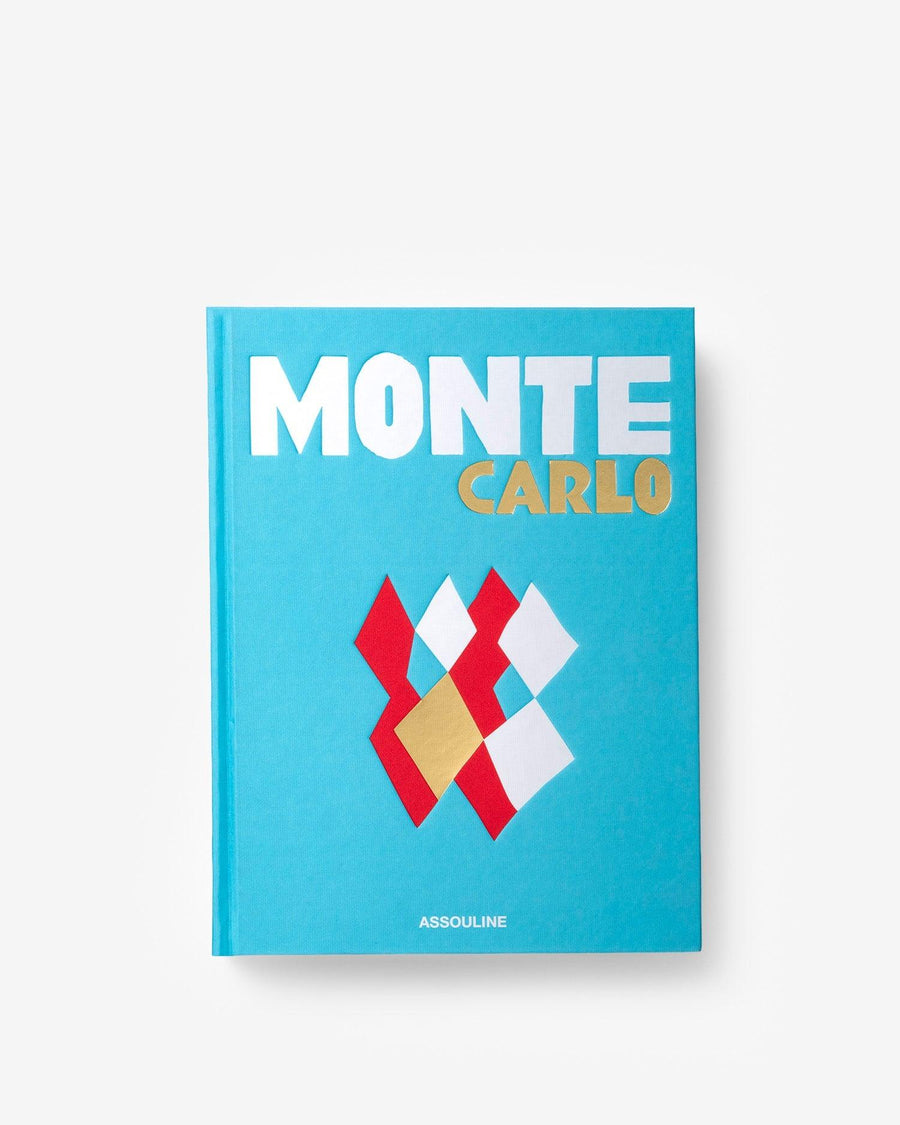 Front cover page of a luxurious hardbound Assouline's Monte Carlo coffee table book, featuring a vibrant cover with images of Monaco's iconic landmarks, available at Spacio India.