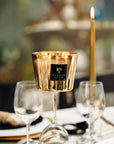 Baobab Aurum Candle Max 10 placed on glass stem - elegant dinner decor and scent available at Spacio India