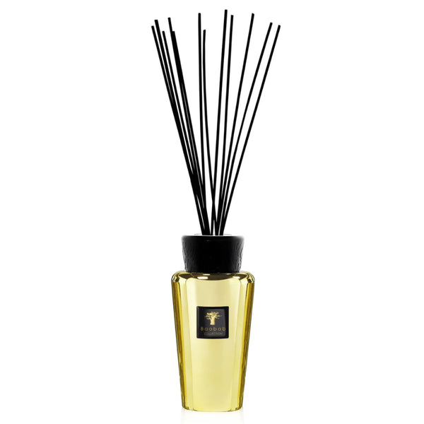 Baobab Aurum Diffuser 500ml featuring elegant gold glass bottle and black diffuser reeds, a luxury home fragrance available at Spacio India retail stores and online.