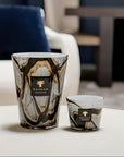 Two sizes of Baobab Stones Marble Candle on a centre table in luxury living room setting, available at Spacio India