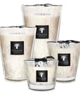 Collection of Baobab White Pearls Candles in multiple sizes, featuring glass jars with floral scent, available at Spacio India.