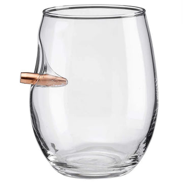 Clear wine glass with a bullet-shaped object inside on a white background from American brand Benshot available at Spacio retail stores in Mumbai & Kolkata. 