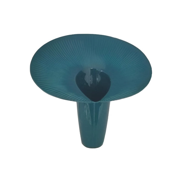 Teal-colored vase with a textured surface on a white background