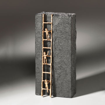 A Butzon & Bercker sculpture depicting a ladder with two people on it, serving as a motivational symbol for success and achievement in the SEO industry.