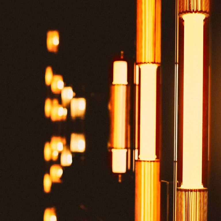 Lit up In the tube wall and vertical light from DCW Editions