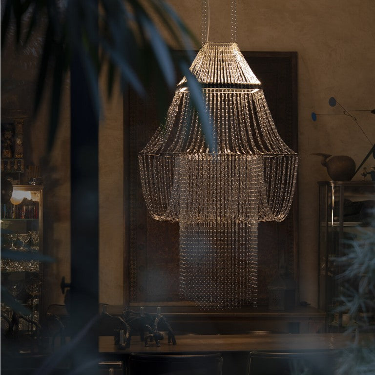 A chandelier in a modern room interior from DCW Editions