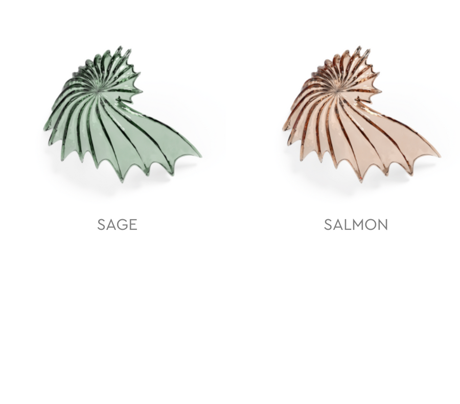 Two shell-shaped glass elements from Italamp's Kaleido collection in different finishes on a white background