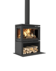 A modern black metal wood-burning stove with a visible fire inside and a log storage compartment underneath, shown on a plain white background.