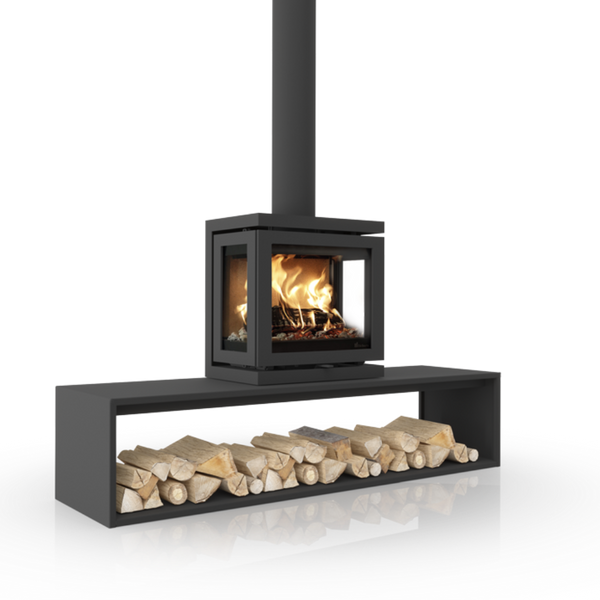A modern black metal wood-burning fireplace with a tall chimney stack, a square firebox showing a glowing flame, and an open shelf below holding stacked logs, isolated on a white background.
