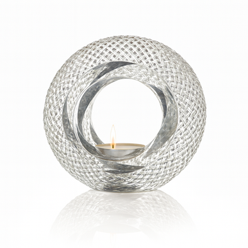 Decorative crystal candle holder with a diamond cut on a white background
