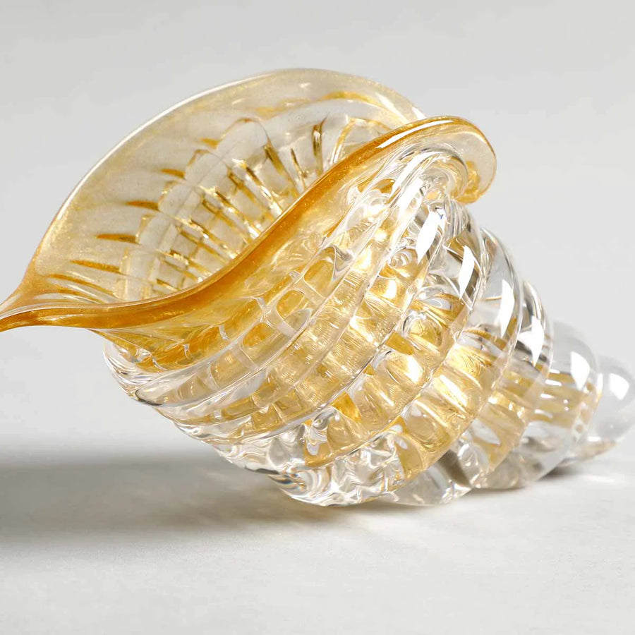 Detailed close-up of the golden-rimmed crystal cornucopia art object from Duccio Di Segna, sold by Spacio India