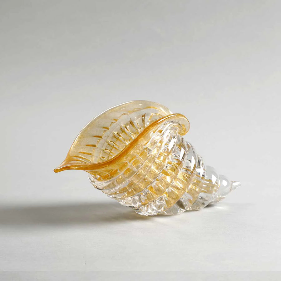 Elegant amber and gold cornucopia glass sculpture by Duccio Di Segna, crystal decor object showcased at Spacio India