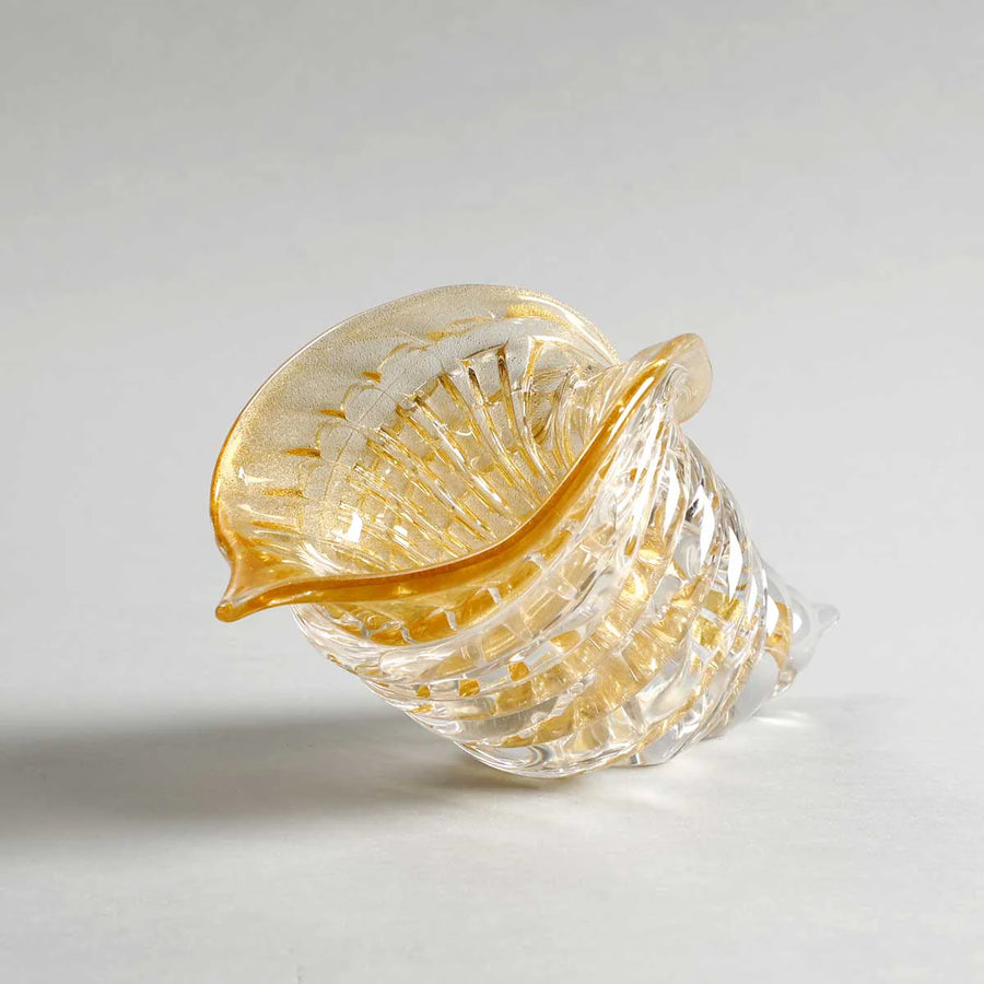 Close-up view of Duccio Di Segna crystal cornucopia in amber and gold, premium decor from Spacio India