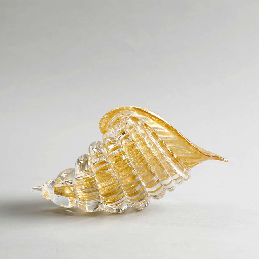 Rear view of Duccio Di Segna crystal cornucopia sculpture with golden highlights, art decor at Spacio India