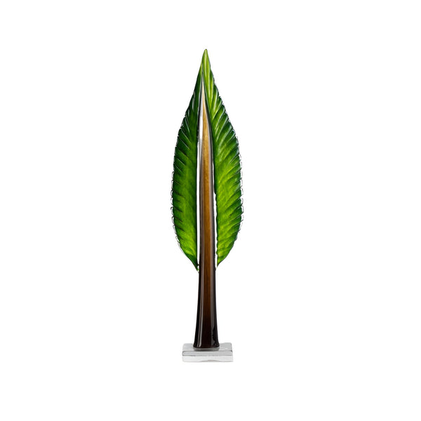 Decorative crystal sculpture of a leaf on a white background