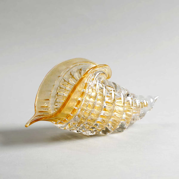 Side view of Duccio Di Segna Big Amber & Gold Cornucopia crystal sculpture showing shell form, luxury decor accessory from Spacio India