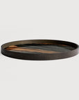 A round decorative tray with a dark textured rim and a marbled interior featuring black, gray, and warm brown tones, shown on a light gray background.
