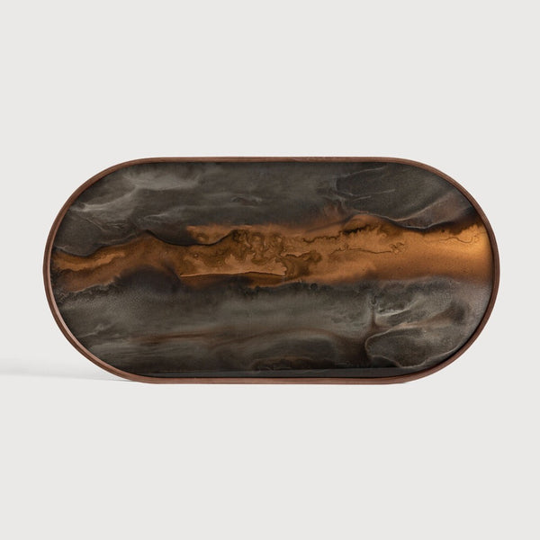 Rectangular brown and black wood and glass tray on a light gray background