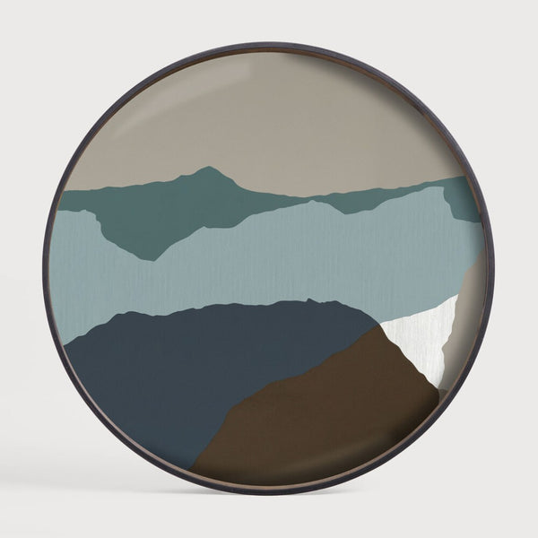 Round wall art cum serving tray with mountain landscape design on a white background